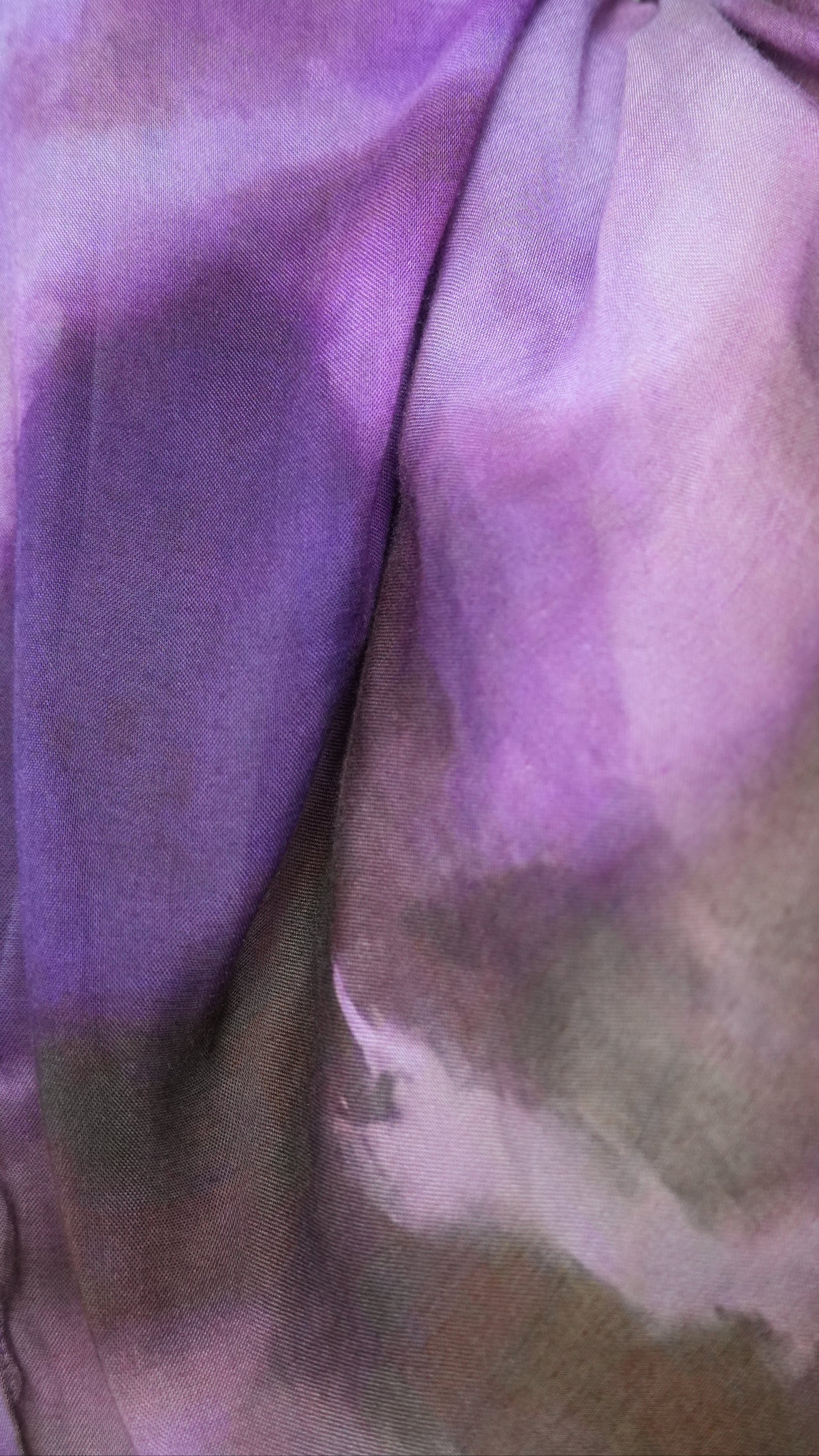 Close-up of a watercolour print purple modal hijab 
